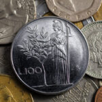 Immagine di una moneta da 5 lire con spiga del 1954, evidenziando dettagli e valore attuale.